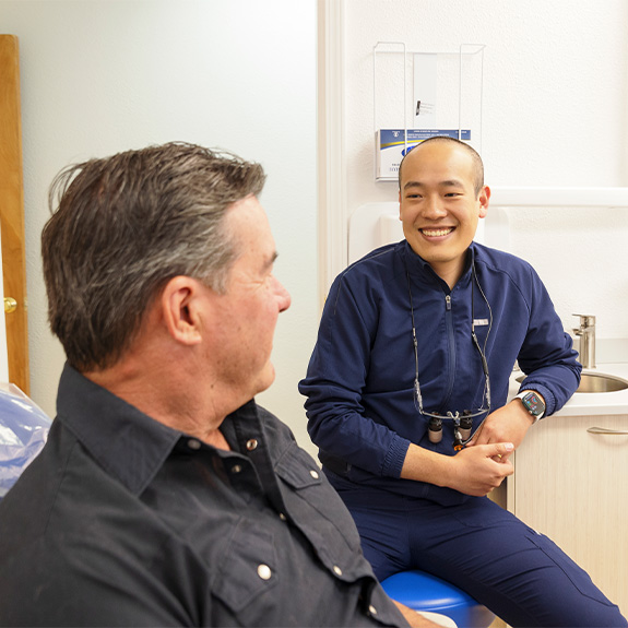 Woman grinning in dental chair