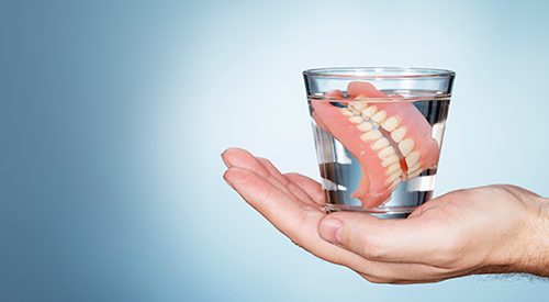 Dentures in a glass