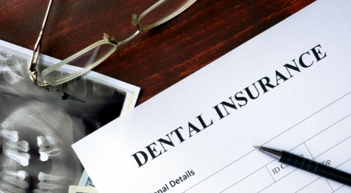 Dental insurance paperwork on desk