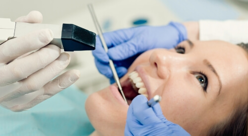 Woman receiving a dental checkup